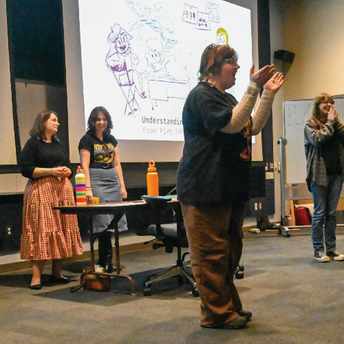 Group of people giving a presentation