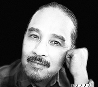 black and white headshot photo of Luis Arabit black and white headshot photo of Luis Arabit