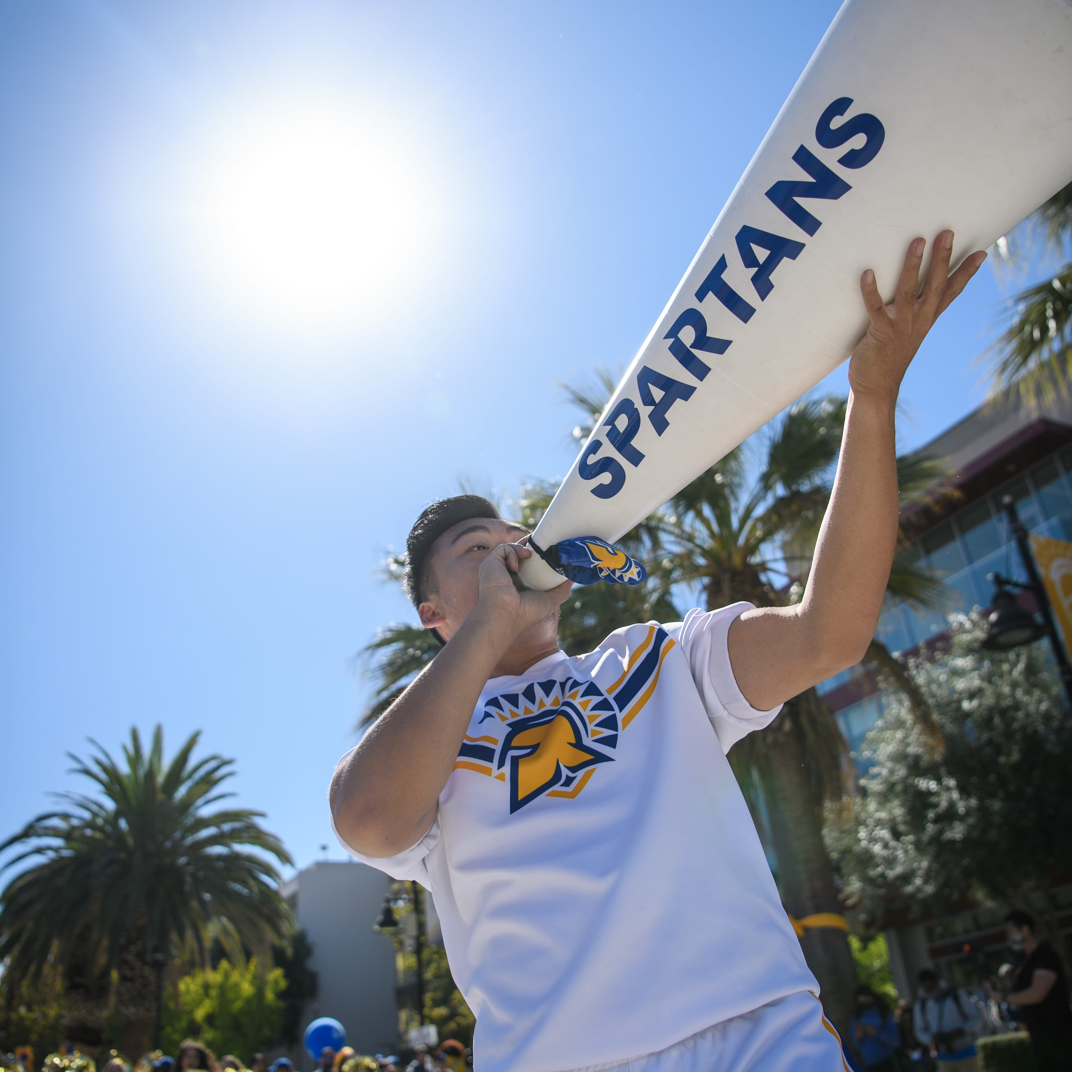 SJSU student using a megaphone