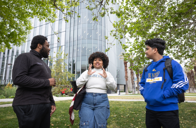 Students standing outside the Interdisciplinary Science Building